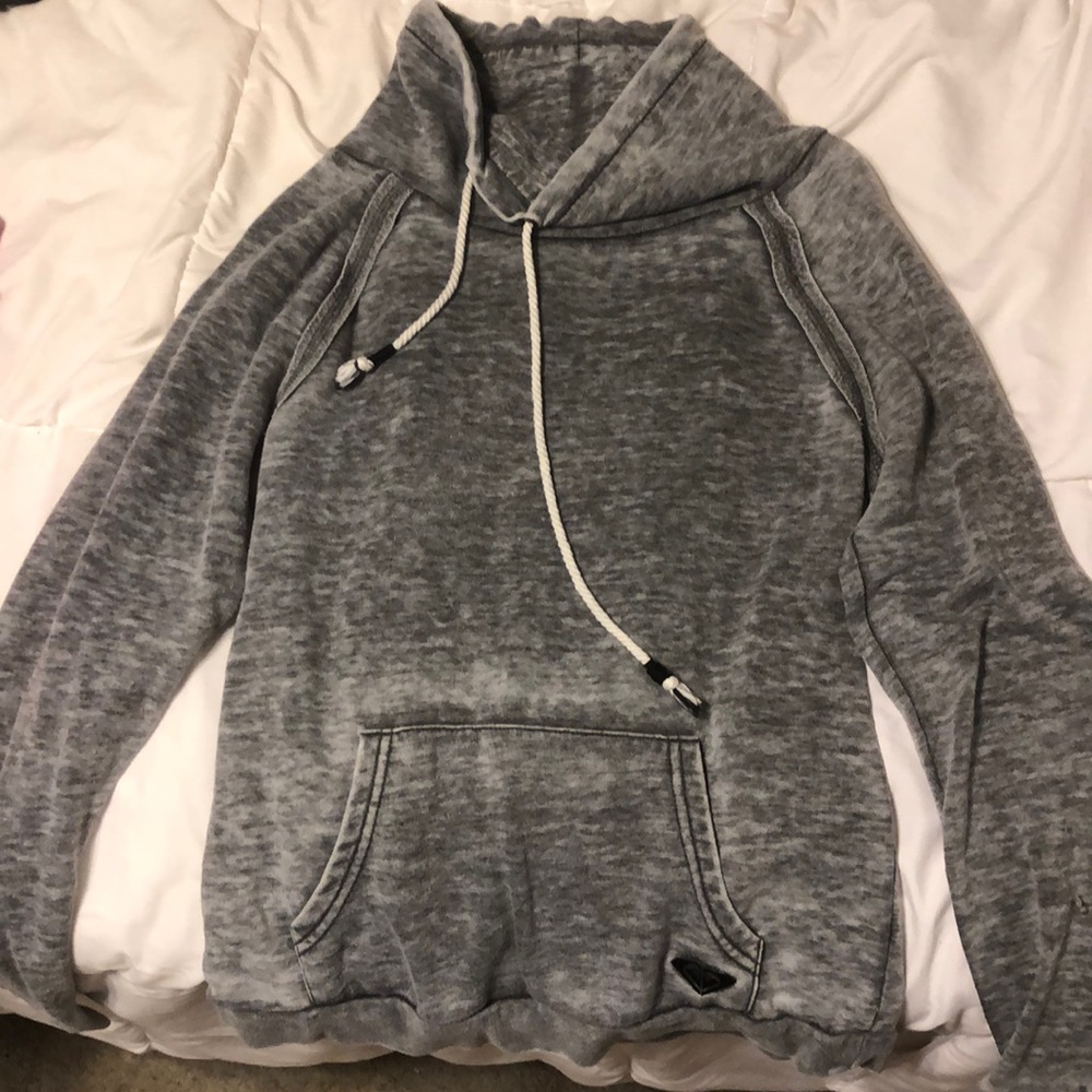 Gray long sleeve shirt with loose turtle neck.